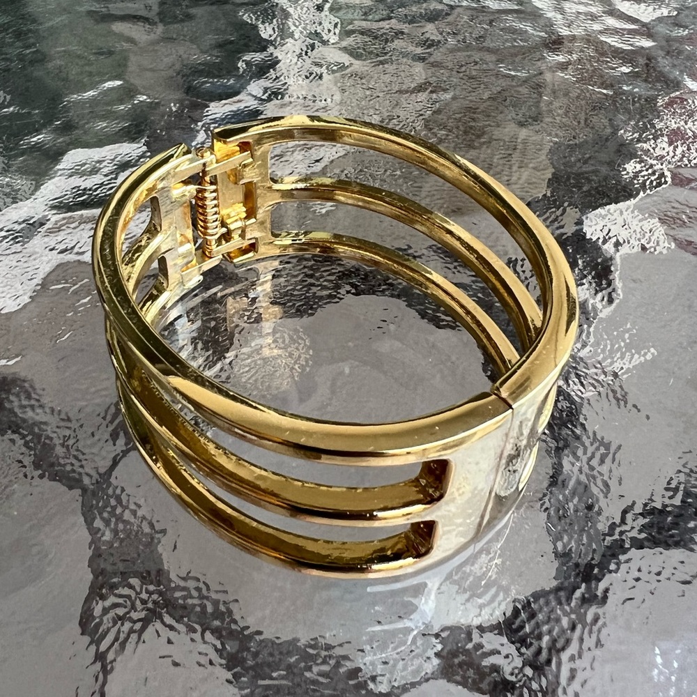 Wide Cuff Bangle metal color gold with spring hinge